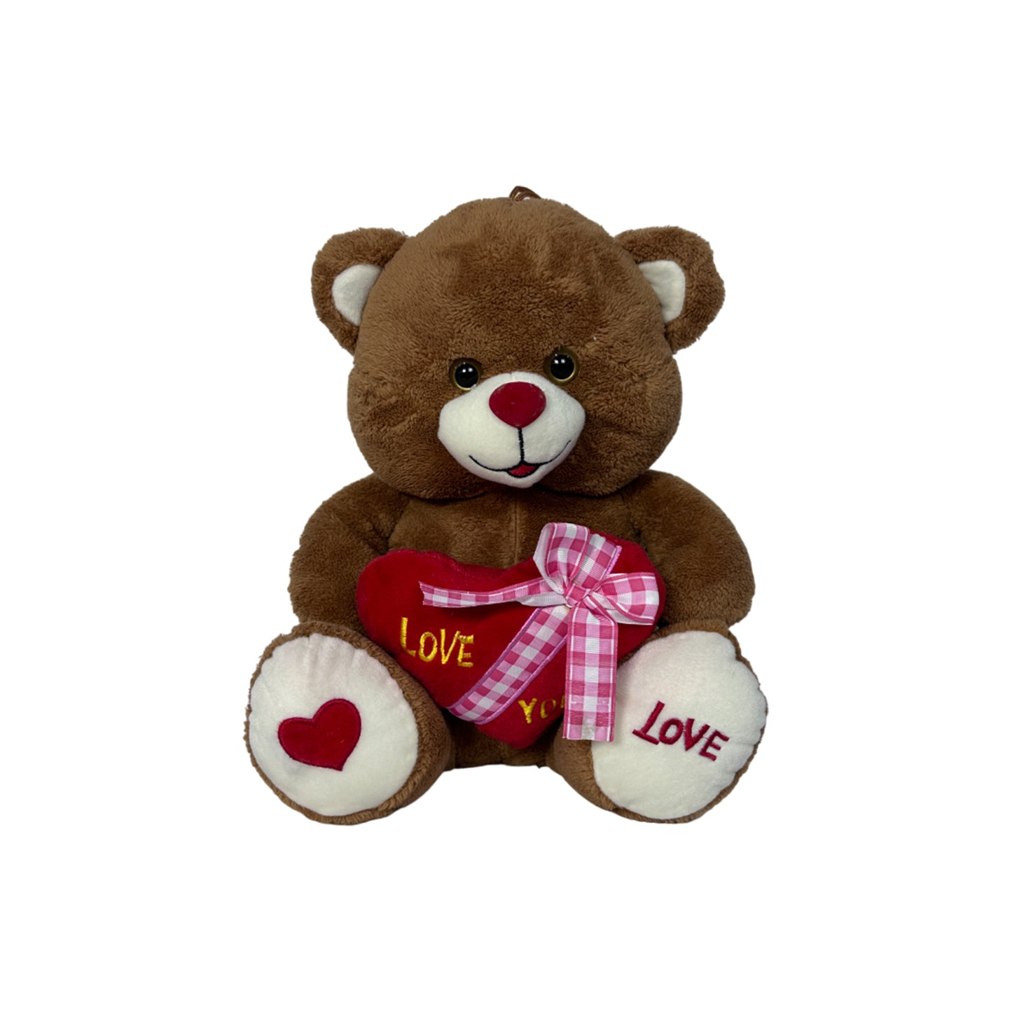 Stuffed brown  Teddy Bear  with  a red heart